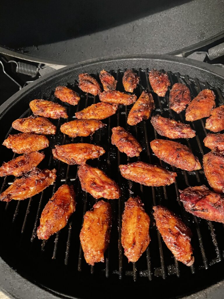 Here you see probably the best chicken wings on the planet on a smoker grill.